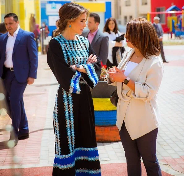 Queen Rania's most stylish moments. Basmet Al-Khair Charitable Society for traditional Jordanian spring dressing