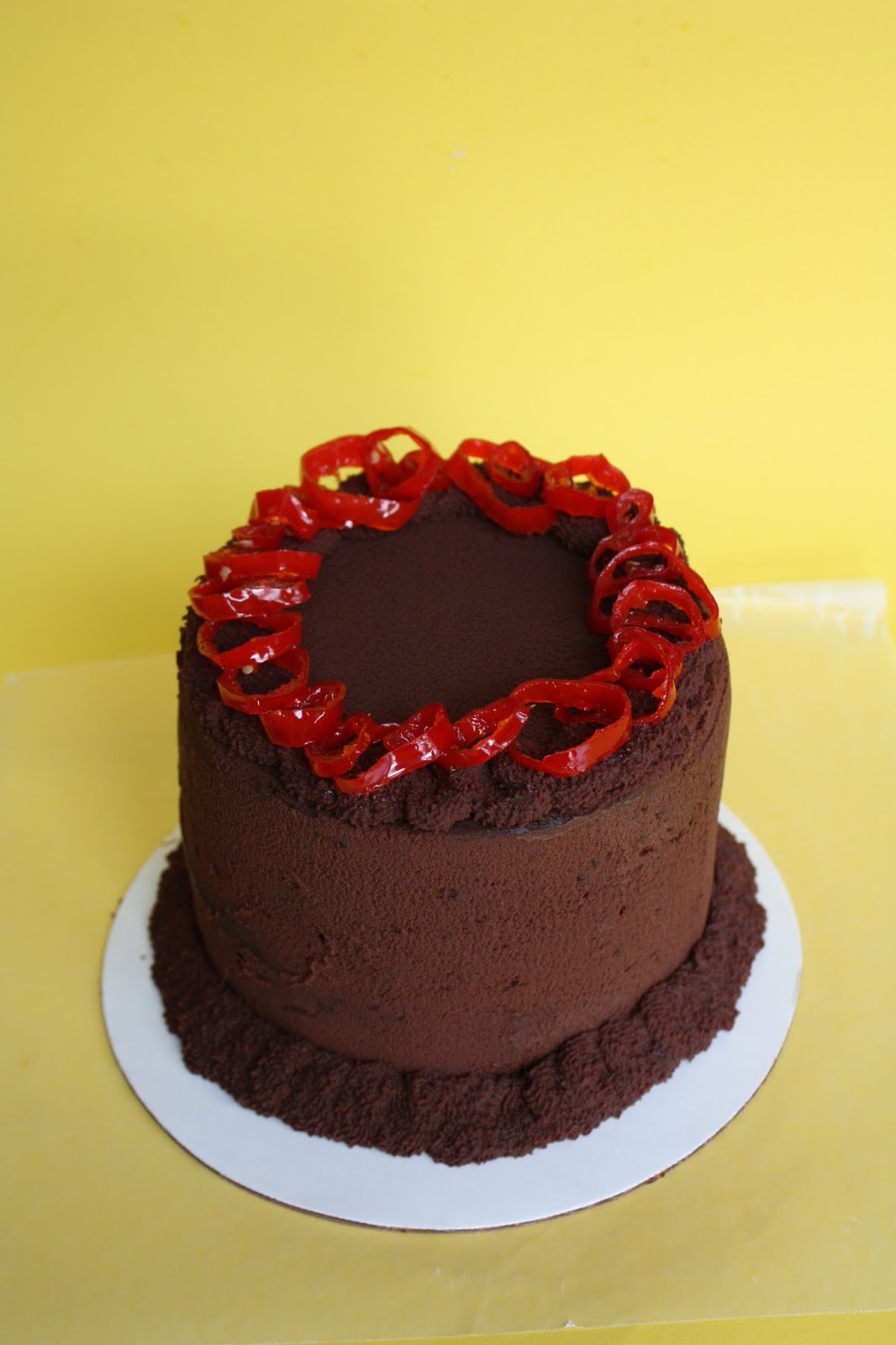 Mexican chocolate cake with whipped ganache and candied