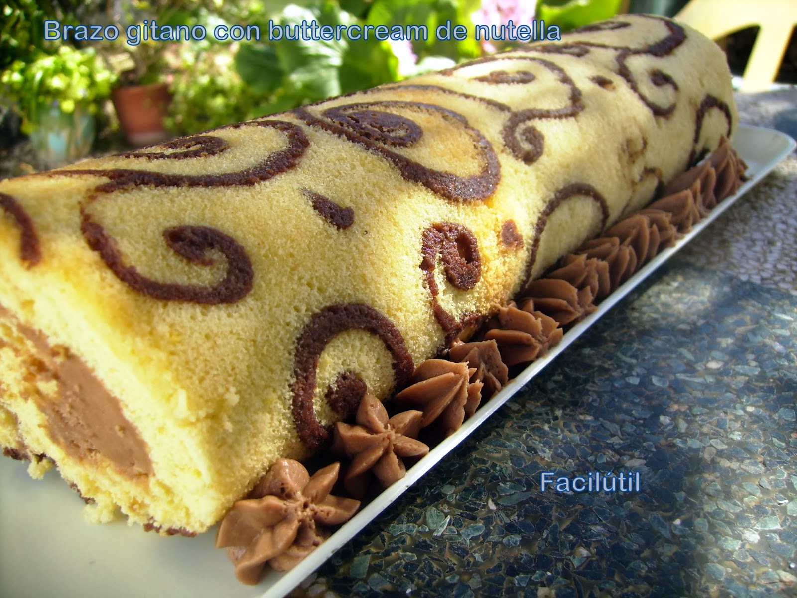 BRAZO GITANO DECORADO RELLENO DE BUTTERCREAM DE NUTELLA