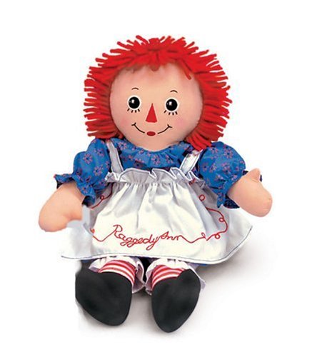 red haired doll with a triangle nose