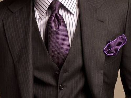 radiant orchid tie with purple pocket square and black jacket