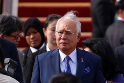 Malaysian police raid flats linked to ex-Pm Najib Razak