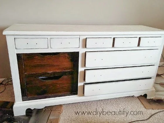 Turn an old dresser into a fabulous and chic farmhouse style console table following this tutorial at DIY beautify!