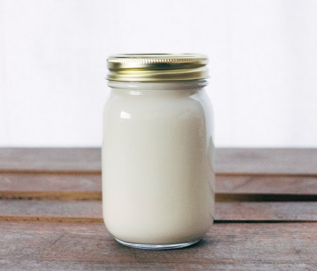 A Mason jar of yogurt made from goat milk