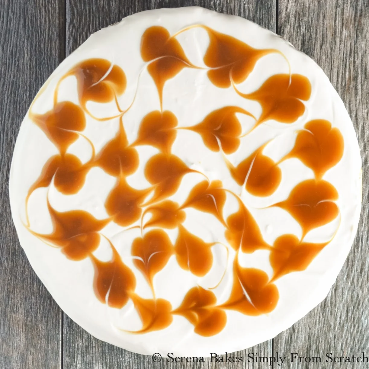 Pumpkin Cheesecake with Butterscotch Swirl recipe is a perfect alternative to pumpkin pie for Thanksgiving from Serena Bakes Simply From Scratch.