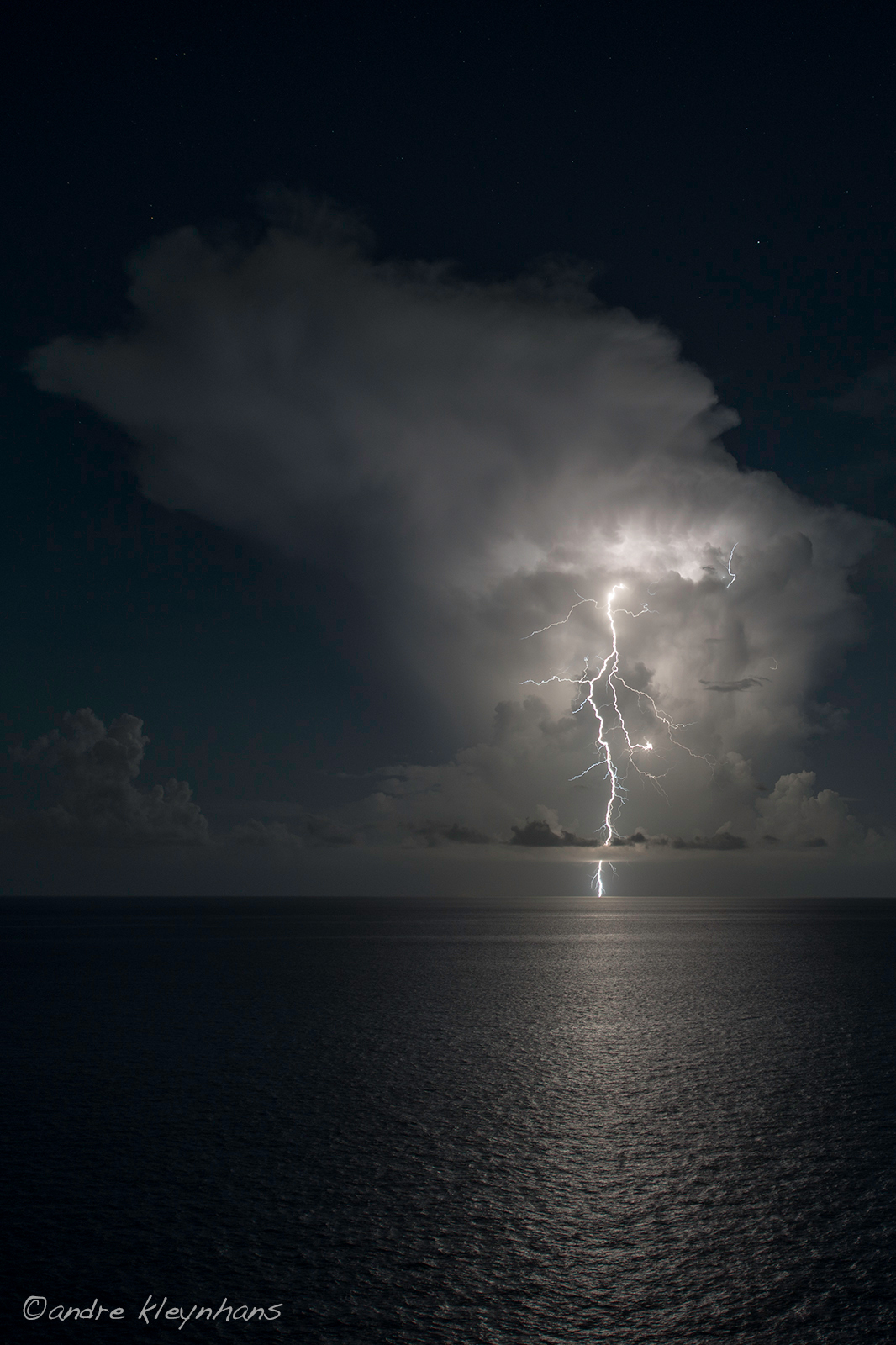 Into The Night Photography Ocean Lightning by Andre Kleynhans