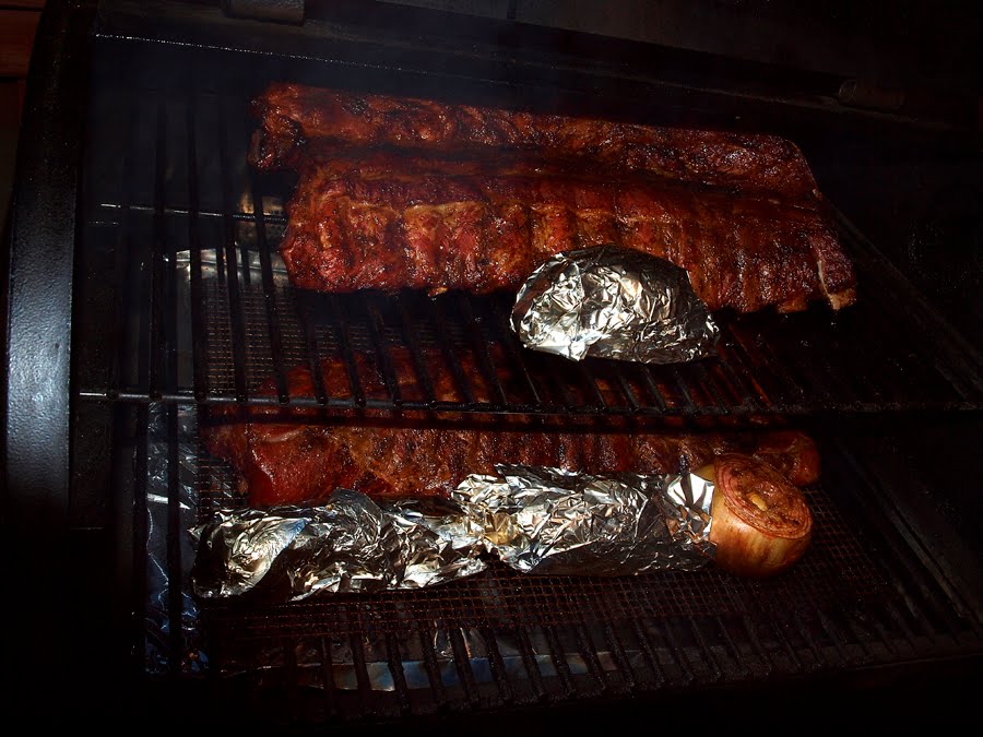 Pellet Smoker Cooking Pork Back Ribs in Parchment Paper