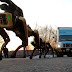 Just a bunch of robot dogs pulling a truck!