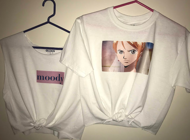 diy graphic crop tops inspired by nami of one piece anime. graphic designs from weatheria and thriller bark arc complete