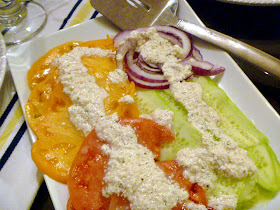 Go Greek! Tomato Cucumber and Onion Salad with Feta Vinaigrette: Heirloom tomatoes that are bursting with flavor and topped with a light feta dressing!