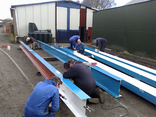 Painting girders for Houghwell Burn bridge