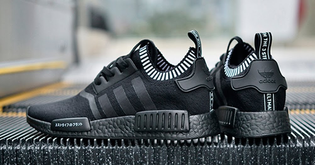 nmd black with writing