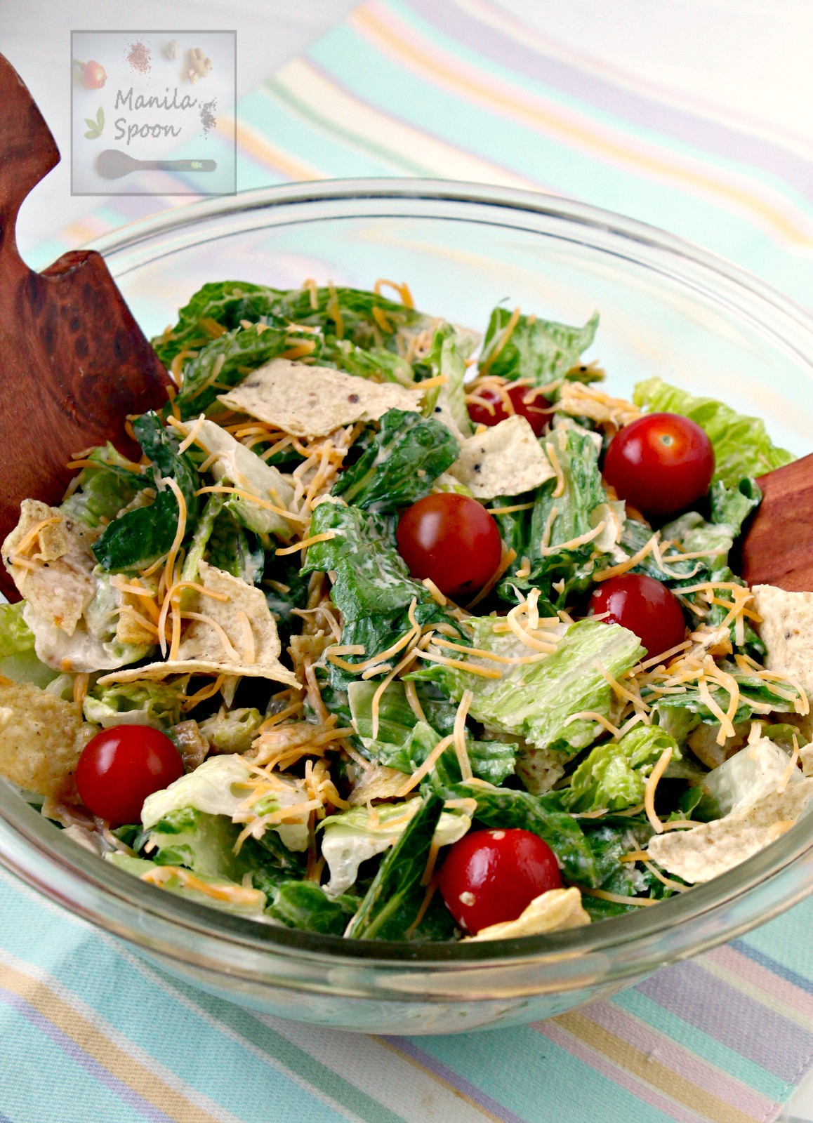 Crunchy tortillas and cumin-flavored dressing give this southwestern-style salad its delicious flavor! With few ingredients and just 5 minutes to make - it's a winner every time! | manilaspoon.com