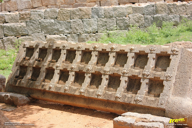 Large monolithic granite door before Royal enclosure in Hampi, Ballari district, Karnataka, India