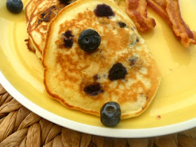 Fluffy, tender pancakes, bursting with hot blueberries and country flavor! A weekend breakfast staple.  Easy Country Blueberry Pancakes - Slice of Southern