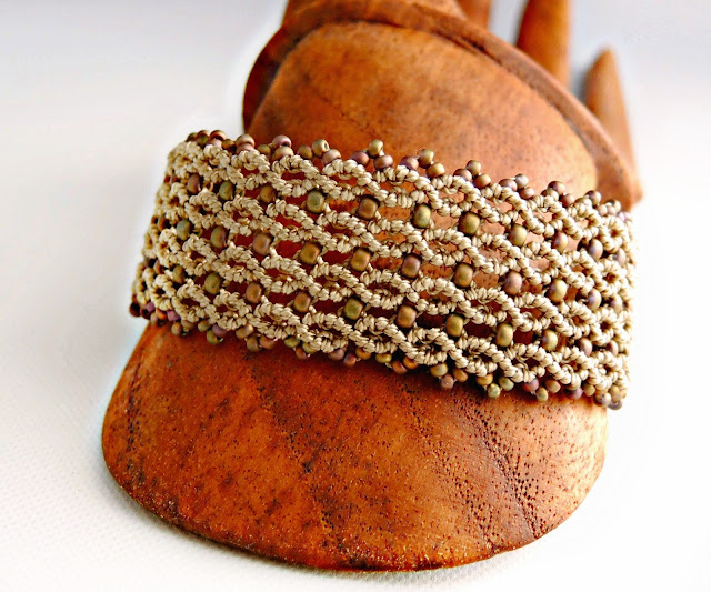 Micro macrame cuff by Sherri Stokey. Micro macrame cuff by Sherri Stokey.