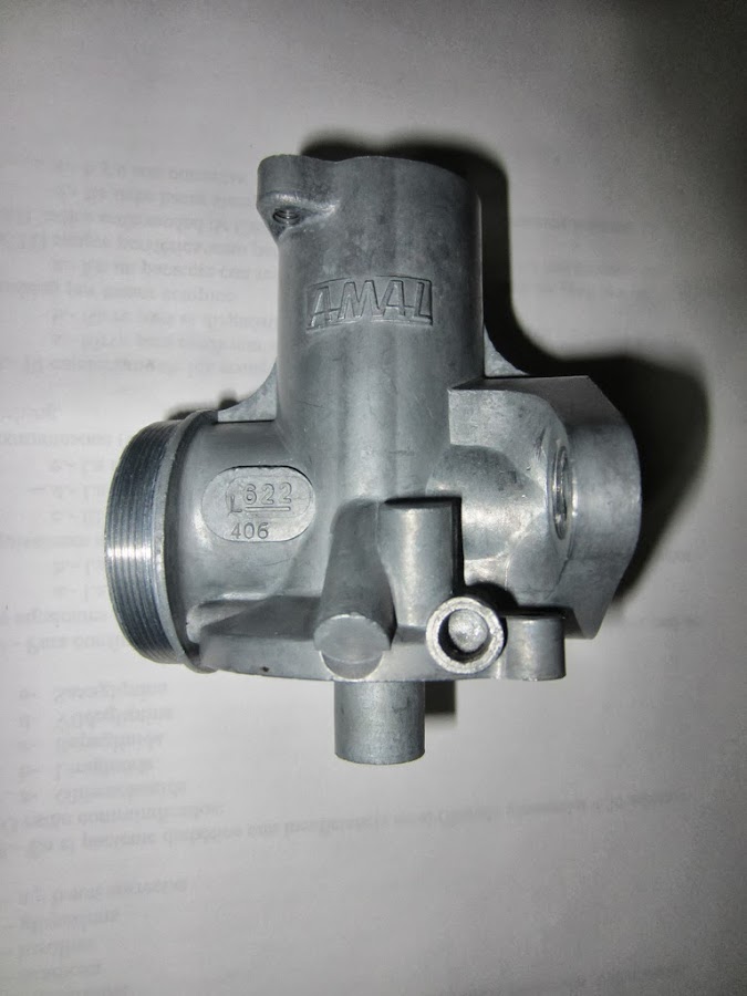 Cuerpo del carburador después de ser limpiado con ultrasonidos