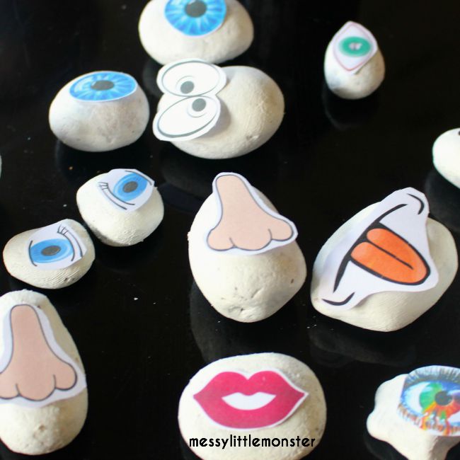 An easy stone / rock / pebble craft for kids.  Make funny faces using these FREE PRINTABLE face parts.  A perfect outdoor activity using nature for summer. A fun 'ourselves' or 'all about me' project.