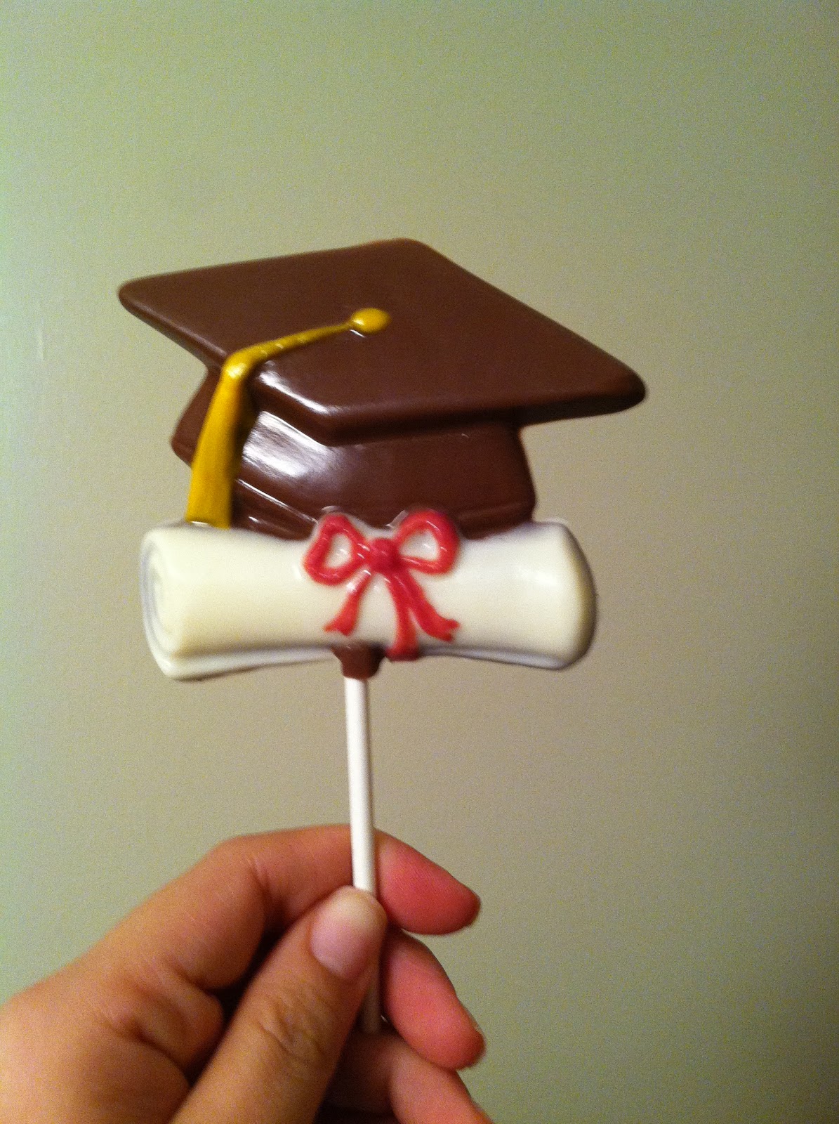 Julie Bakes Graduation lollipops