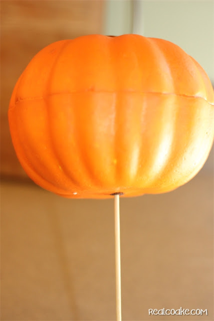 Easy DIY crafts using a dollar store pumpkin and transforming it with a little time and glitter from realcoake.com