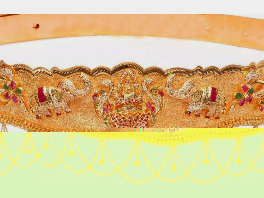 Jewellery Designs Heavy Gold Vaddanam with Lakshmi Devi idol in the