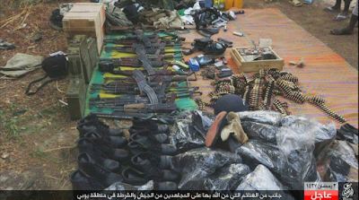 Boko Haram Sect Shows Off Its Spoils Of War After Attack On Yobe Town (Photos) Capture