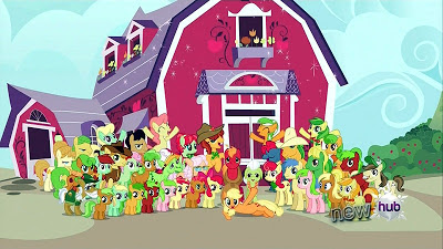 The Apple Family in front of the barn