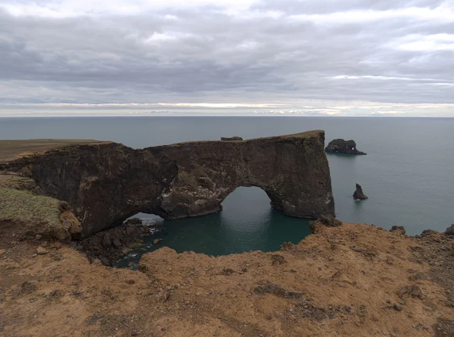 Natural rock arch on Dyrhólaey Peninsula along Iceland's South Coast