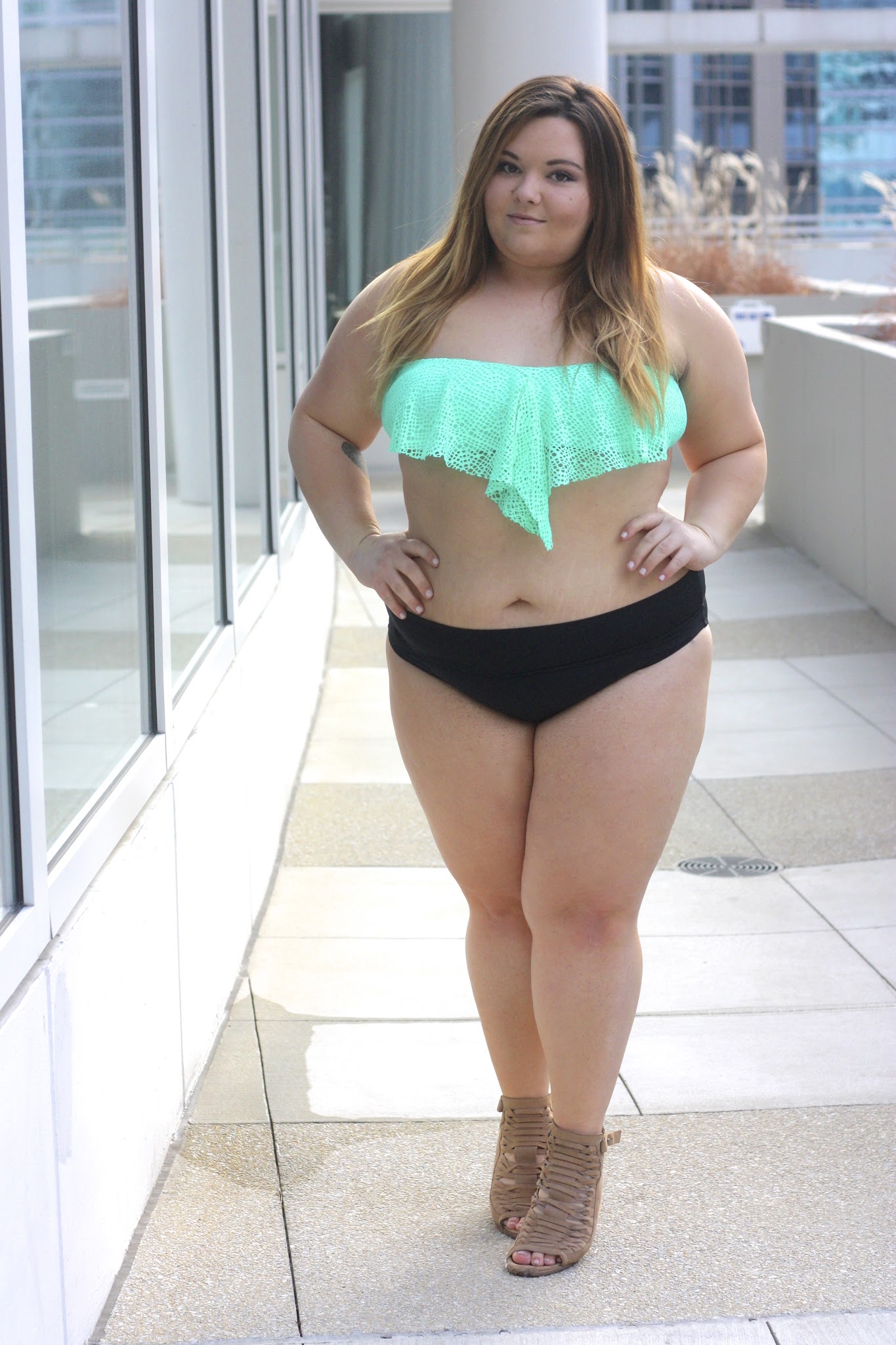 Petite and plus size fashion blogger Natalie in the city shares her favorite target bikinis and one pieces and talks about body confidence.