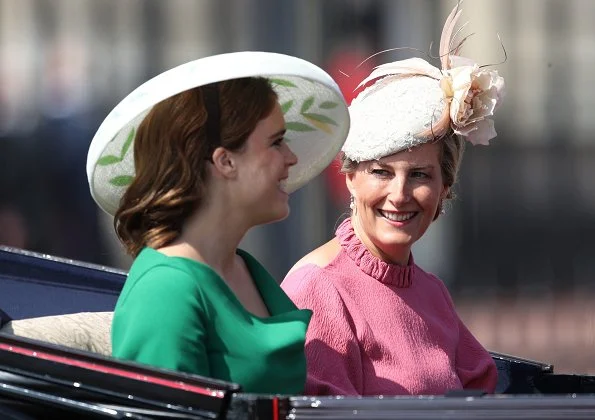 Meghan Markle, The Duchess of Sussex is wearing a dress by Carolina Herrera. The Duchess of Cambridge is wearing a dress by Alexander McQueen. wessex