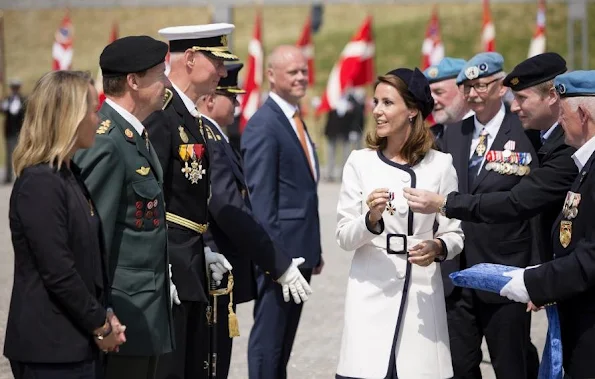 Princess Marie of Denmark participates In Internation Peacekeepers Day at The Citadel. Marie wears Paule Ka White Two-Tone Belted Coat, By Malene Birger Paxlow Pump