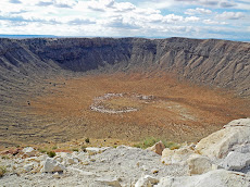 Mile-wide Meteor Crater in Arizona created 50,000 ka by a 150 foot bolide travelling at 26,000 mph.