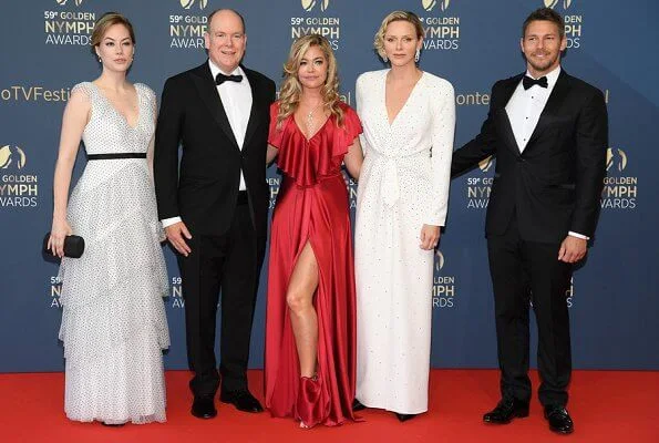 Golden Nymph Award Michael Douglas. Princess Charlene is wearing Carolina Herrera dress. Maria Carolina, Princess Camilla and Maria Chiara