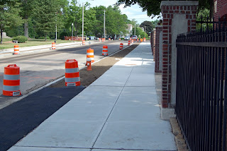 new sidewalks being put in along Emmons and Main St