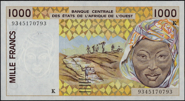 West African States Currency 1000 CFA Francs banknote 1993 African woman wearing a head cloth