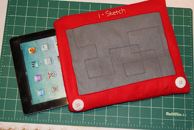 iPad in its Etch a Sketch cover