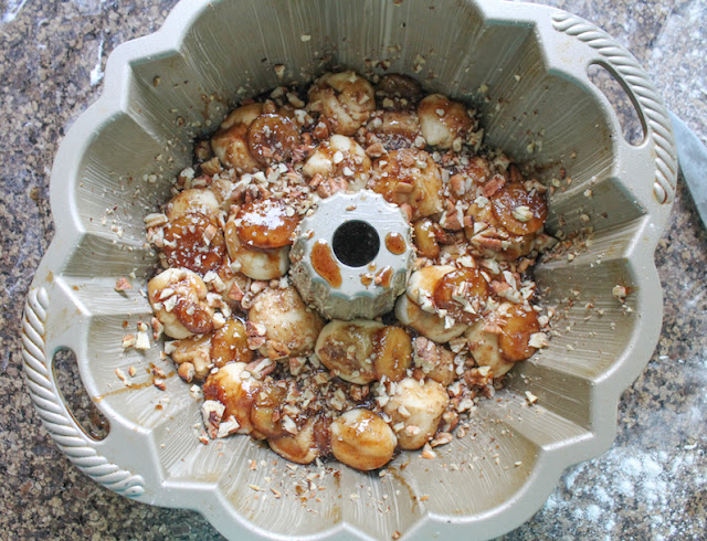 Food Lust People Love: Bananas Foster Monkey Bread takes everyone's favorite pull apart loaf (usually made with bread dough balls rolled in sugar) to a whole new holiday level with bananas and rum. Put one of these guys on your party table and watch it disappear.