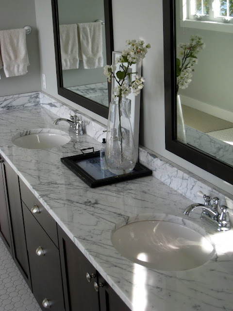 A double sink and large mirror
