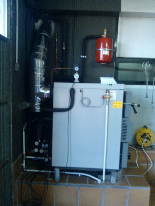 Instalación de caldera de llama invertida