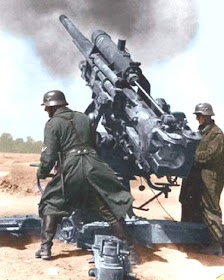 88 mm Flak gun firing Color photo World war II worldwartwo.filminspector.com