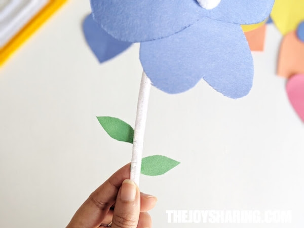 Add paper leaves to the your flowers.
