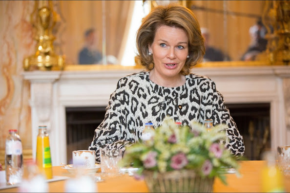 Belgian State Secretary for Poverty, Fraud and Science Elke Sleurs and Queen Mathilde of Belgium attends a presentation on poverty at the Royal Palace