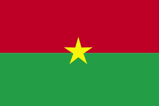 Burkina Faso flag has two equal horizontal bands of red (top) and green with a yellow five-pointed star in the center; red recalls the country's struggle for independence, green is for hope and abundance, and yellow represents the country's mineral wealth.