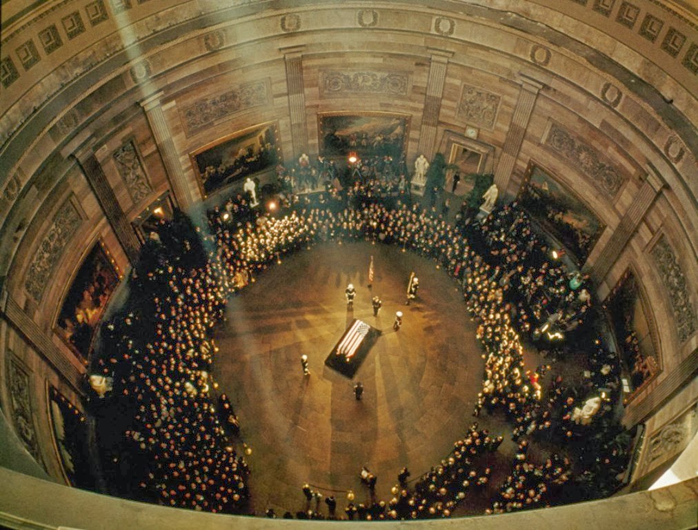 John F. Kennedy's coffin lies in state in the Capitol Building, 1963
