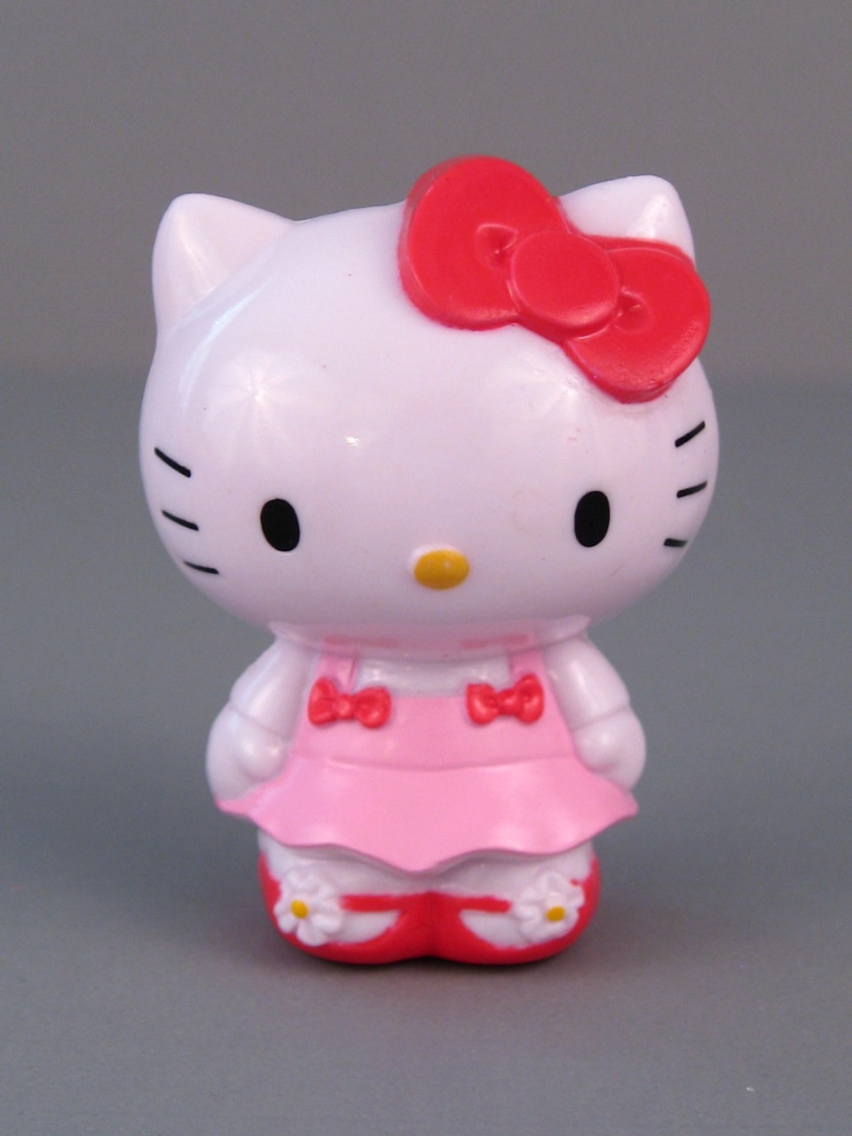 Fitness Fashion: Hello Kitty figurine and plush toy