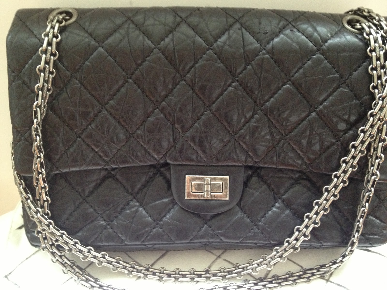 Preloved 100% Authentic Designer Bags for sale: Preloved Chanel 2.55 Black leather with silver chain