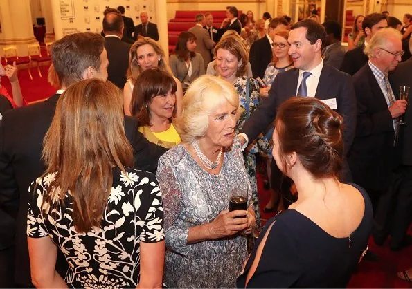 Duchess of Cornwall attended a reception at Buckingham Palace to mark the 50th Anniversary of the Man Booker Prize. Duchess wore print summer dress