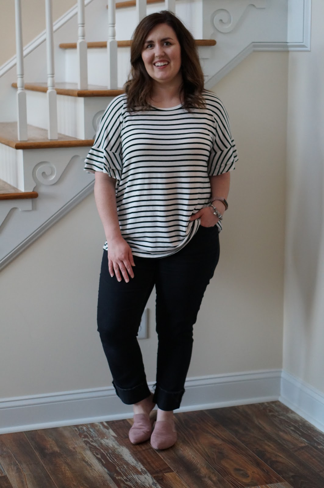 Popular North Carolina style blogger shares how to style a ruffle sleeve tee for work.  Click here to read it!