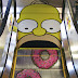 Simpatica escalera eléctrica de los Simpson