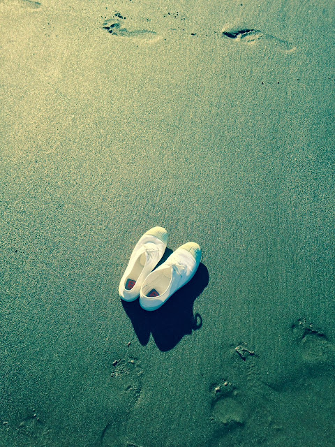 white pumps on an english beach